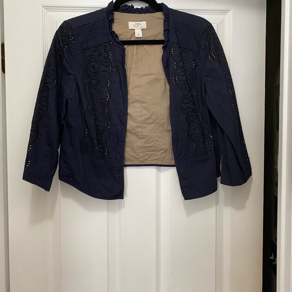 Short waisted Navy blazer with tan inside